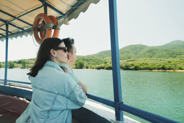 istock Happy couple sailing on the boat 2151696820