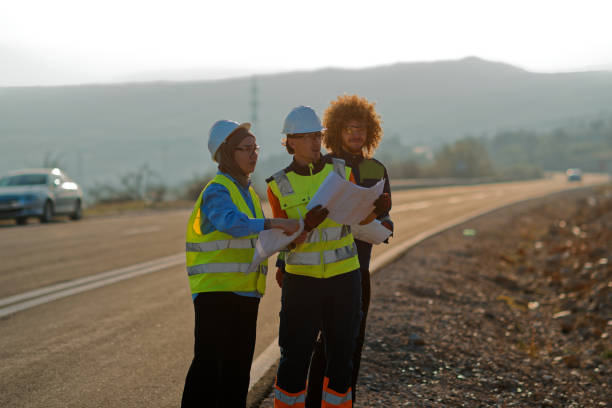 istock A team of engineers and workers oversees a wind turbine project at a modern wind farm, working together to ensure the efficient generation of renewable energy 2151696879