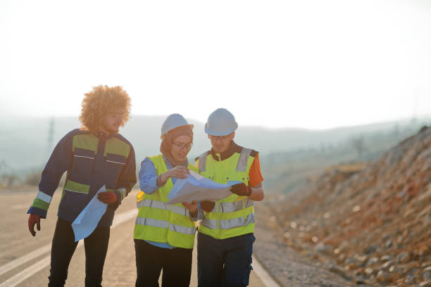 istock A team of engineers and workers oversees a wind turbine project at a modern wind farm, working together to ensure the efficient generation of renewable energy 2151697703