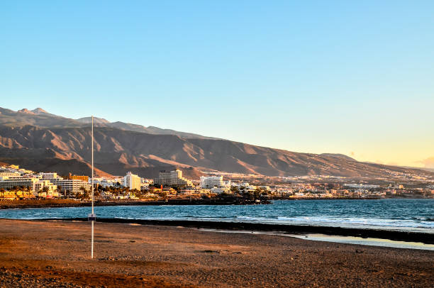 istock A beach with a city in the background 2151698970