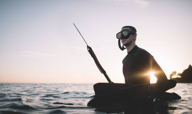 istock Young spearfisherman in water 2151701184
