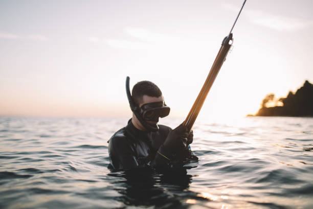 istock Spearfisherman in the water 2151701237