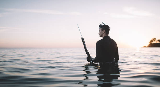 istock Spearfisherman in the water 2151701285