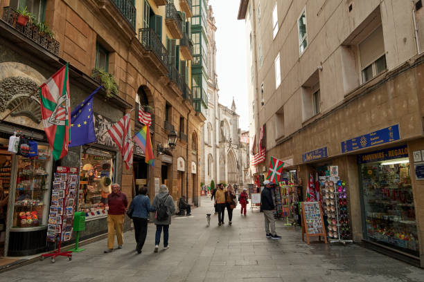 Bilbao, Spain; 3rd of May, 2024. Souvenir shops in Correo Street near Santiago Plaza in the old part of Bilbao. In the last years Bilbao is a destination for tourist from all over the world. That is changing the city scape in the city centre