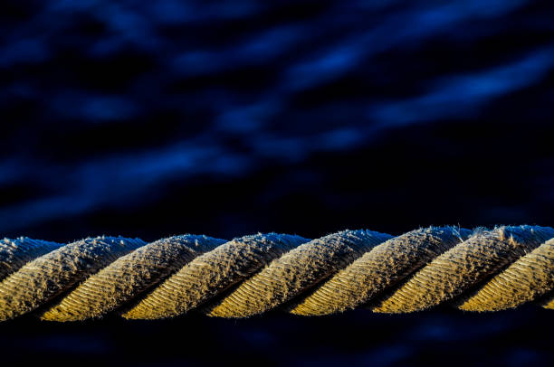 Detail of a rusty old docking and rope in Limenas, Thassos.