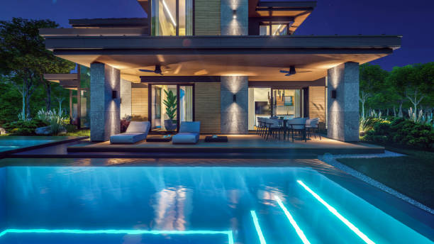 istock 3d rendering of modern house in luxurious style in night 2151705555