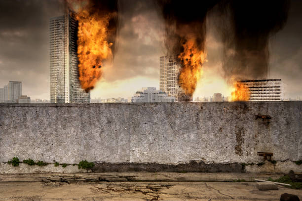 Burned and destroyed building in apocalypse city. A building is on fire and burning down