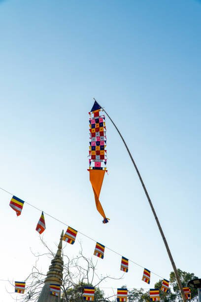 Buddhist flags hang in a Khmer temple