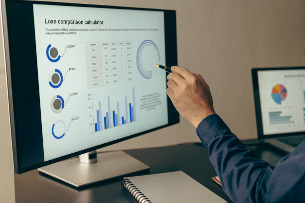istock Businessman analyzing company financial report, balance sheet, working with document graphs Save photos for the stock market, office, taxes, close-up photos. 2151710077