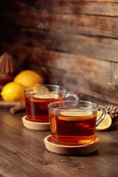 istock Tea with lemon on a wooden table. 2151710137