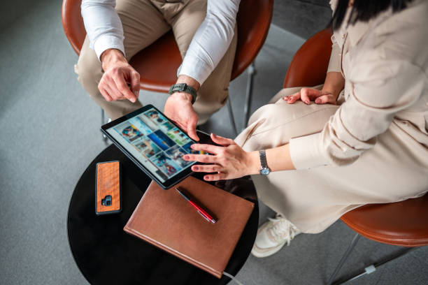 istock Caucasian Business Team Engaged in Digital Collaboration 2151713479