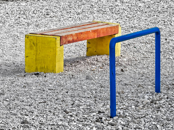 istock Concrete Bench on Gravel Field 2151723107