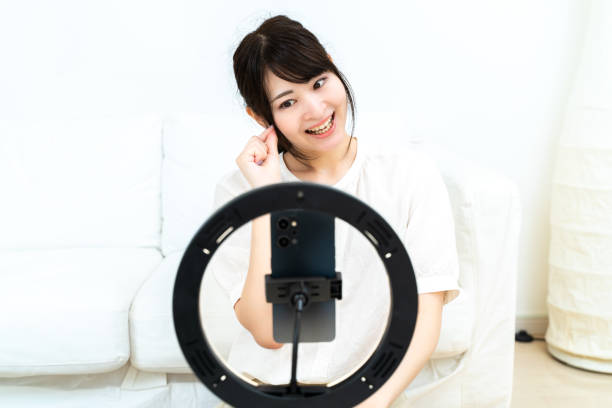istock A woman streaming videos 2151723240
