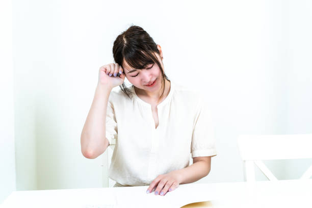 A woman keeping a household account book