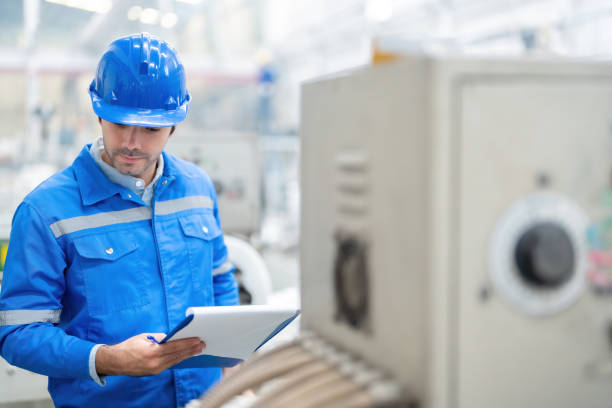 istock Equipped with technical prowess, the European engineer oversees industrial machinery within the plastic and steel factory, driving efficiency and competitiveness in global markets. 2151724013
