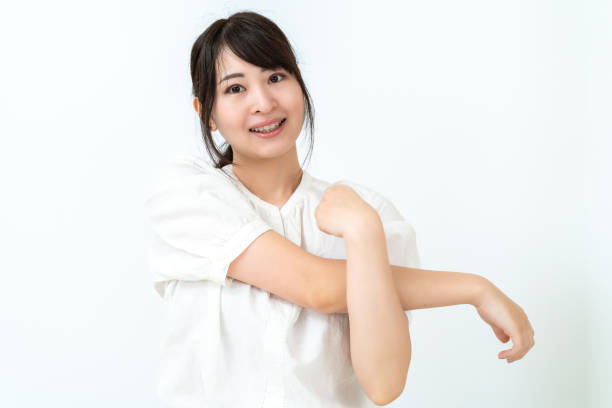 istock A woman stretching at home 2151724147