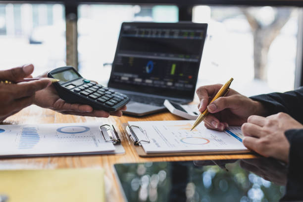 istock Financial advisor meeting is discussing data analysis, financial statistics, accounting and financial budget planning. 2151726967