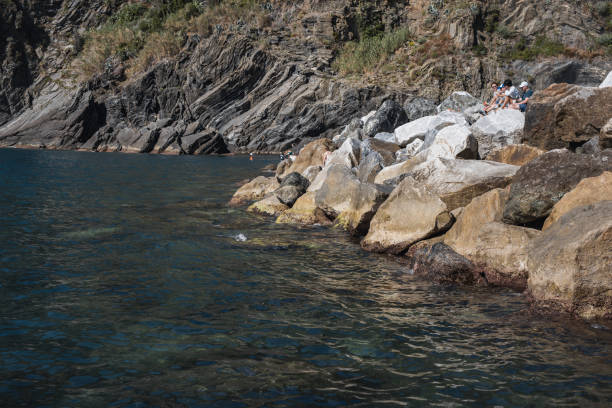 Mediterranean coast of sunny Italy - picturesque coast with rocks and boats - tourist route