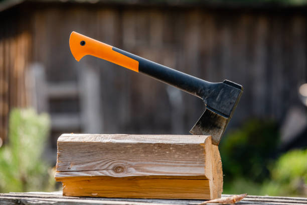 istock A carpenter tool an ax sticks out of a log 2151729854