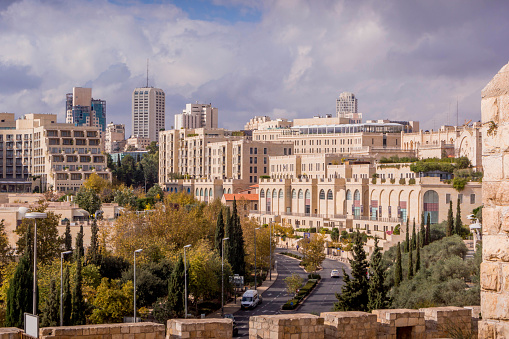 The downtown of Jerusalem, Israel, with the street road, David Citadel Hotel and shopping mall.