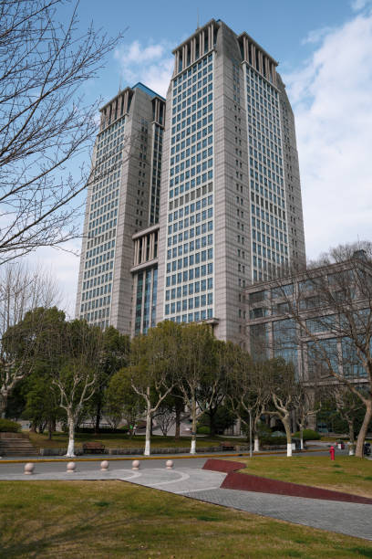 Shenzhen, China -February 17 , 2024:Fudan University's new education building and sculpture in front