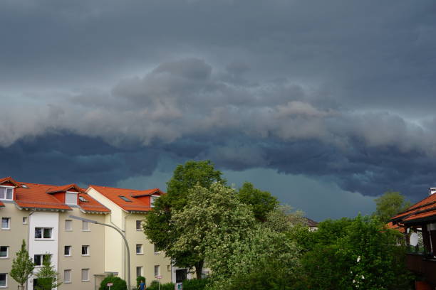istock A thunderstorm is coming. Tragic clouds. Dark clouds. Thunderclouds. Bad weather in Germany, Upper Bavaria, the city of Bad Aibling. 2151743936