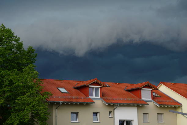 istock A thunderstorm is coming. Tragic clouds. Dark clouds. Thunderclouds. Bad weather in Germany, Upper Bavaria, the city of Bad Aibling. 2151743979