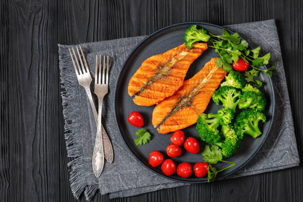 istock grilled salmon steaks with broccoli and tomatoes 2151751204