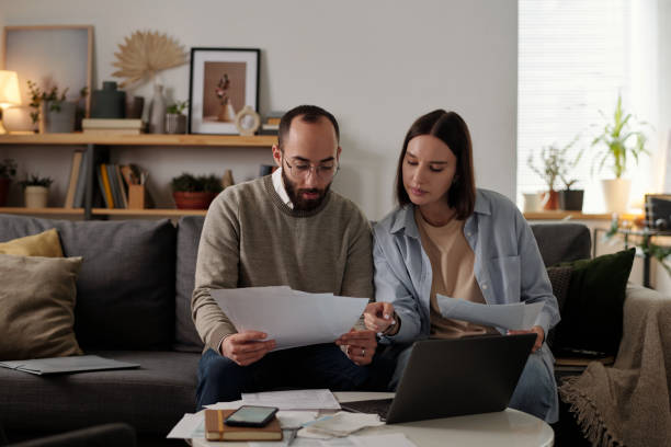 istock Couple discussing financial bills 2151751876