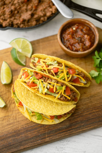istock yellow hard shell tacos  on cutting board 2151758833