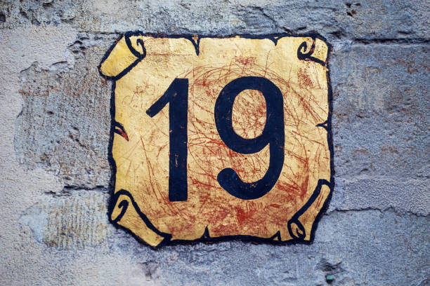istock Nineteen decorative street number on a wall 2151758877