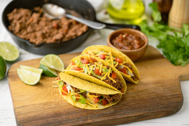 istock yellow hard shell tacos  on cutting board 2151758938