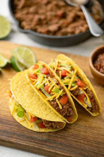 istock yellow hard shell tacos  on cutting board 2151758965