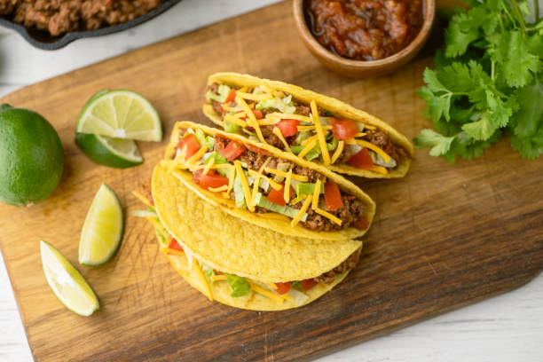 istock yellow hard shell tacos  on cutting board 2151758987