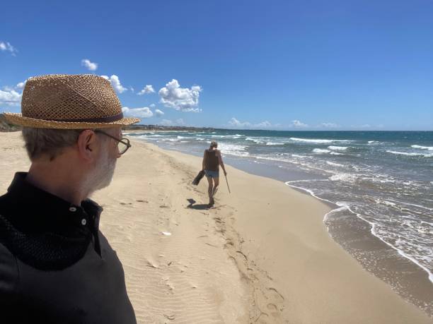 istock Couple Enjoy there Italian Vacation on the Beach 2151760154