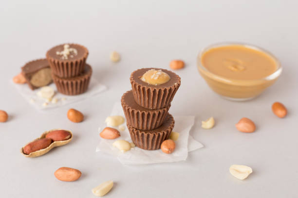 istock Tasty chocolate peanut butter cups on color background 2151765578
