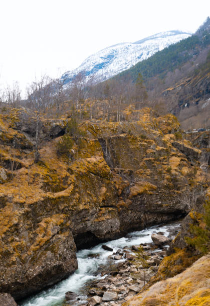 istock Sjurhaugfossen, A mountain range with a river running through it 2151766616