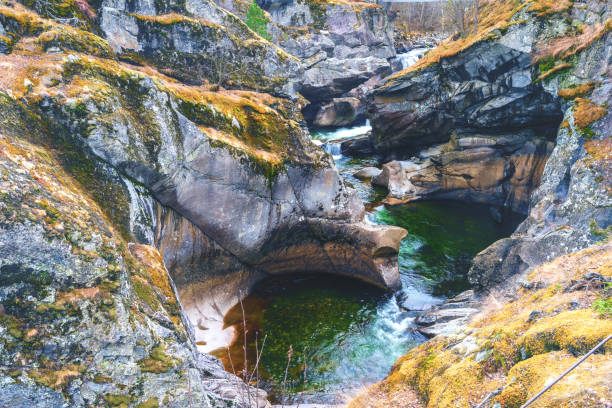 istock Sjurhaugfossen, A mountain range with a river running through it 2151766632