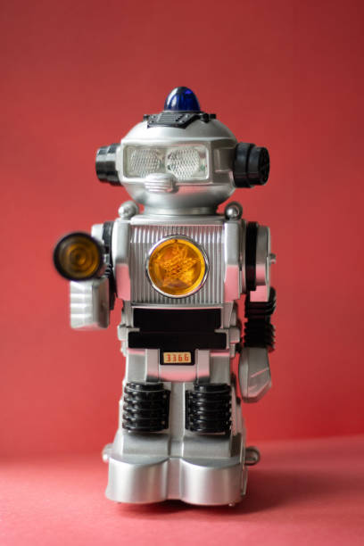 Vintage toy robot on a red background