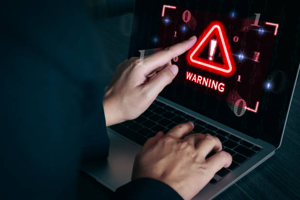 istock Warning sign alert on laptop screen. 2151770691