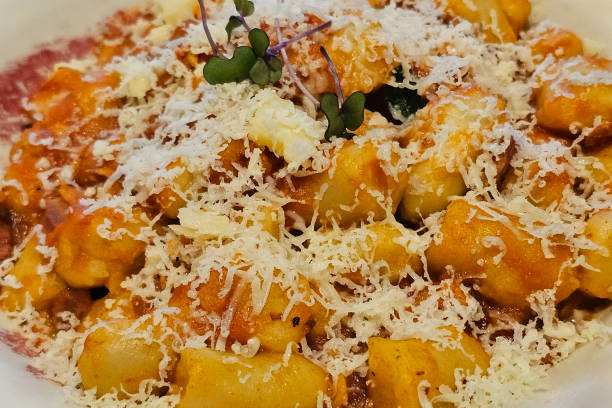 Parmesan cheese grated on top