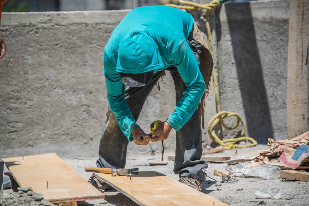 Manual worker working on home renovation process.