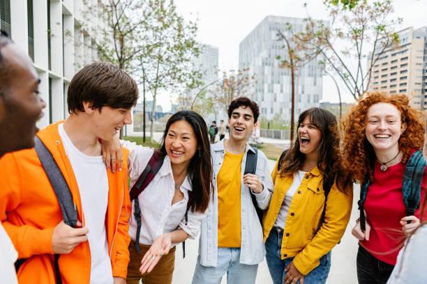 istock Young group of teenagers talking after high school classes. 2151777279