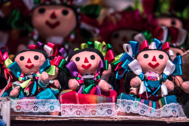 istock Three dolls with colorful ribbons and lace 2151777656