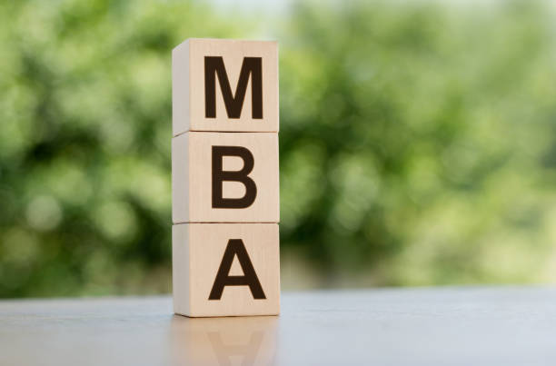 istock A block with the word MBA written on it is placed on a table. 2151795873