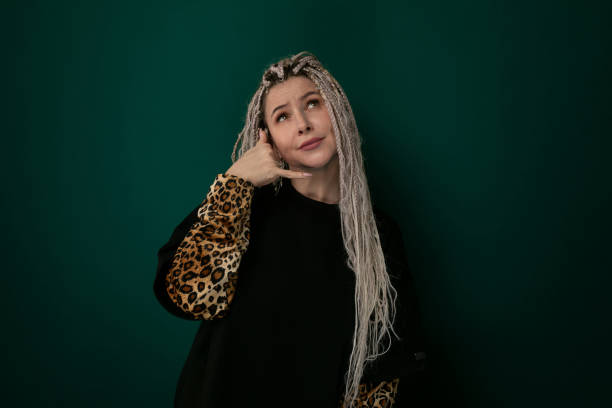 istock Woman With Long White Hair and Leopard Print Jacket 2151796801