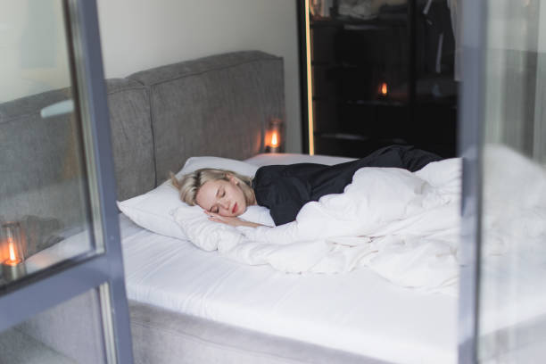 istock Blonde woman sleeping. 2151803460