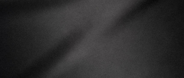 istock Close-Up View of a Black Fabric Texture in Soft Lighting 2151804882