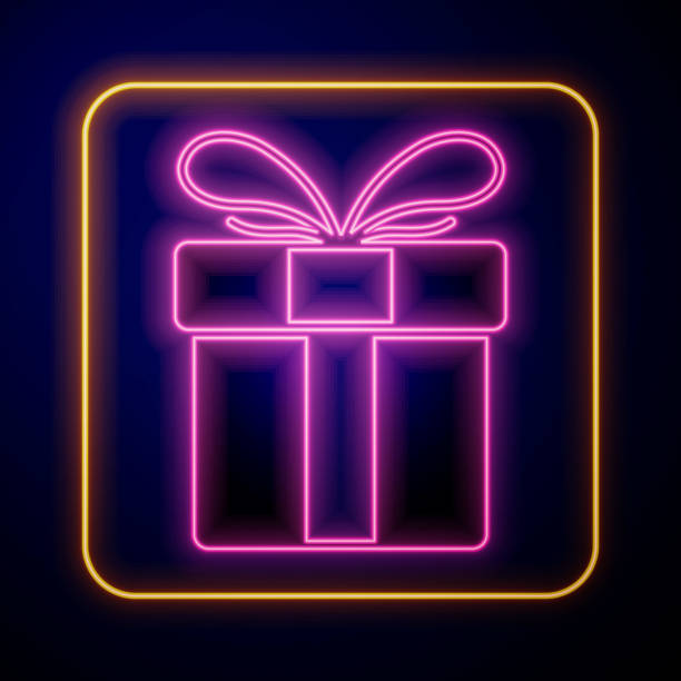 istock Glowing neon Gift box icon isolated on black background. Merry Christmas and Happy New Year. Vector 2151805593