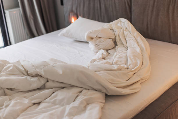istock Blanket on the bed in bedroom. 2151816449